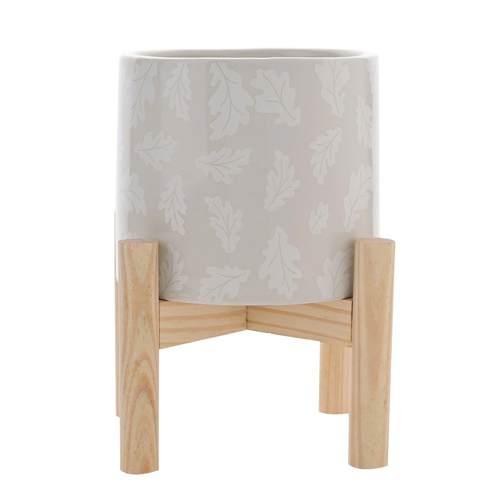 Baksiden av disney potteplante på stativ. Bambi og trampe på andre siden. På baksiden ser man bare den beige keramikk potten med hvite blader som står på tre stativet sitt.