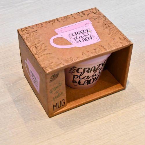 Rosa plante krus kommer i en kjempe flott eske med bilder og tekst på.