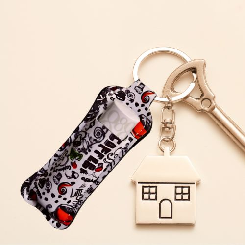 Nøkkelring med veske til lipsyl med kaffemotiv.