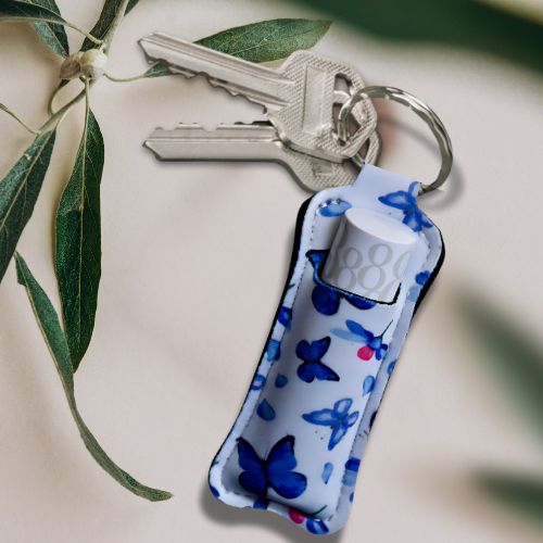 Veske til lypsil eller lepestift med sommerfugl motiv som man enkelt kan henge på foreksempel nøkkelringen.