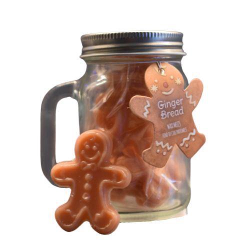 En krukke med duftvoks formet som pepperkakemenn. Hver krukke inneholder 10 stykk.