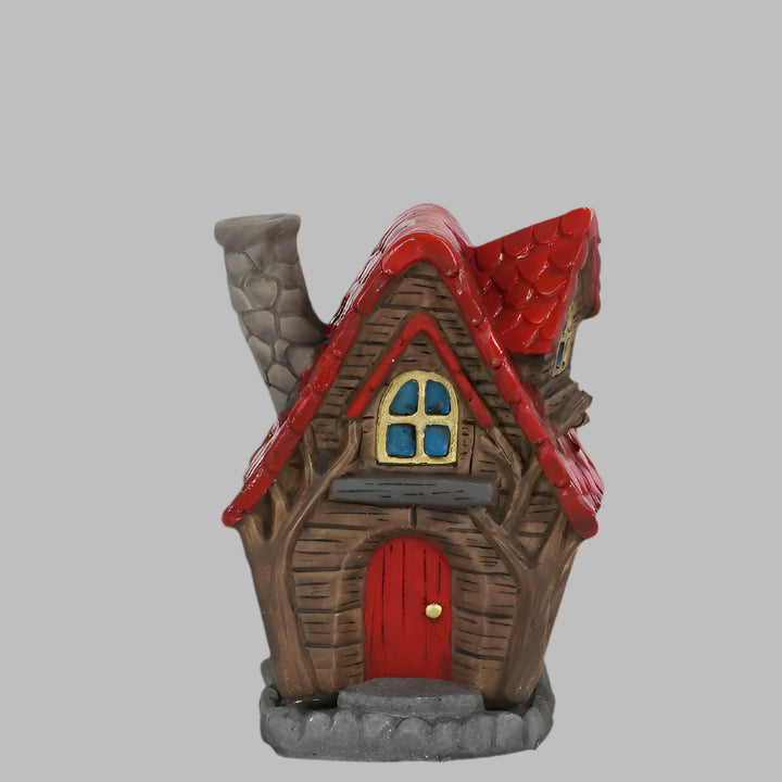 Fairy homes røkelseshus med rødt tak.