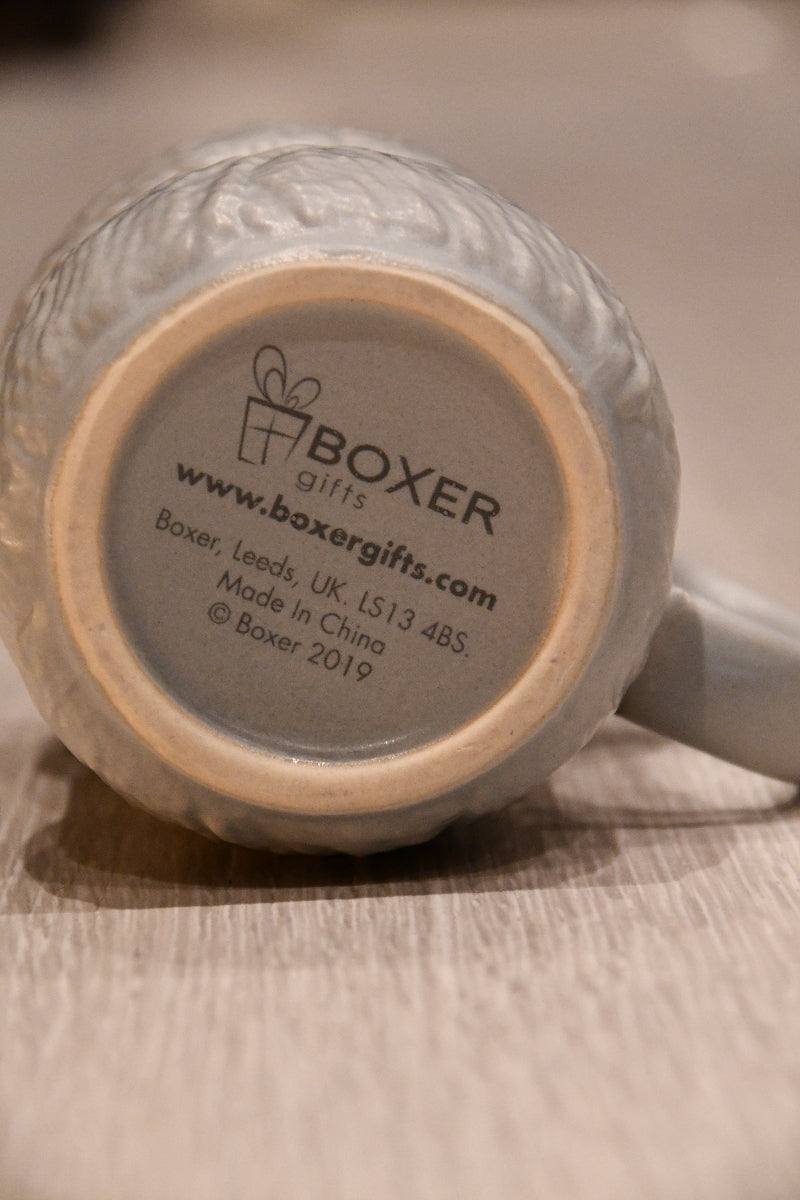 Undersiden av grå strikke krus fra Boxergifts.