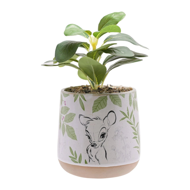 Bambi blomsterpotte med plante i keramikk. Blomster potten med tegne illustrasjoner av bambi med nydelige detaljer vil gi hjemmet ditt det lille ekstra. Fantastisk gave til Disney elskere.