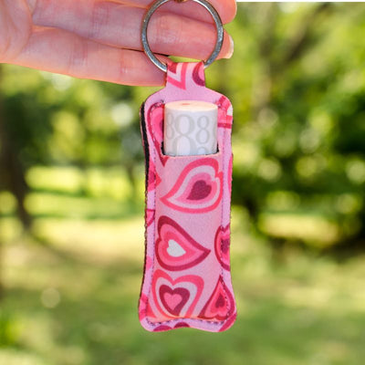 Rosa hjerte veske med lipstick i ute