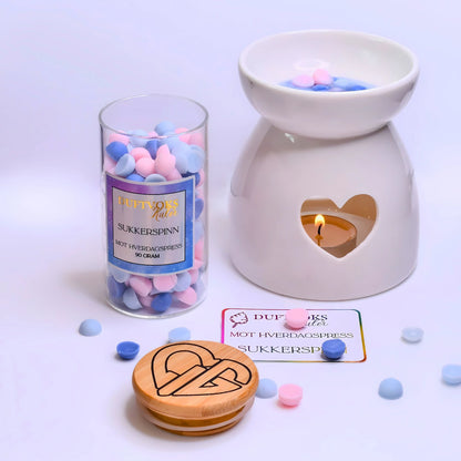 Soya voks duftkuler fyller rommet med en herlig lukt av sukkerspinn. Drøm deg tilbake med nostalgiske dufter håndlaget i norge. Kulene ligger i duft/olje brenneren og smelter, samtidig som duften fyller rommet. 