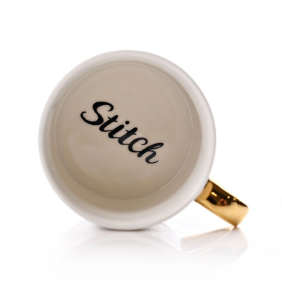 Stitch kopp med teksten Stitch i bunnen inni fra Disney