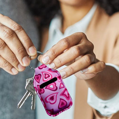 Rosa hjerte nøkkelring til airpods eller andre ørepropper.